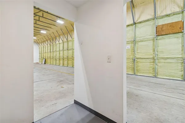 a view of a room with shelves