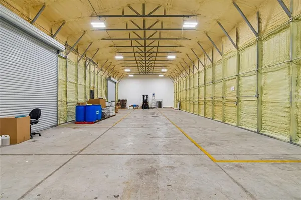 a view of an house with backyard and garden