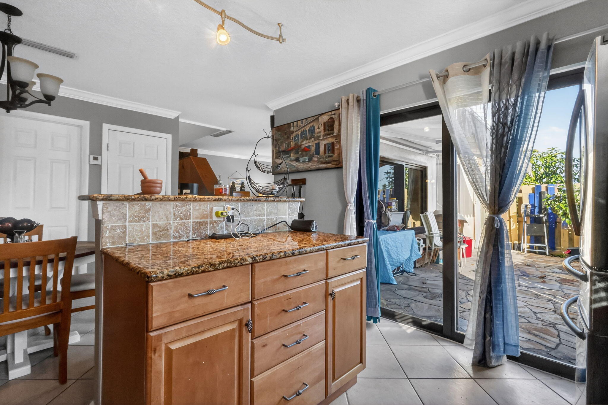 5204 Waterview Circle Palm Springs, FL 33461 - Photo 13 of 30 a bathroom with a granite countertop sink a mirror and shower
