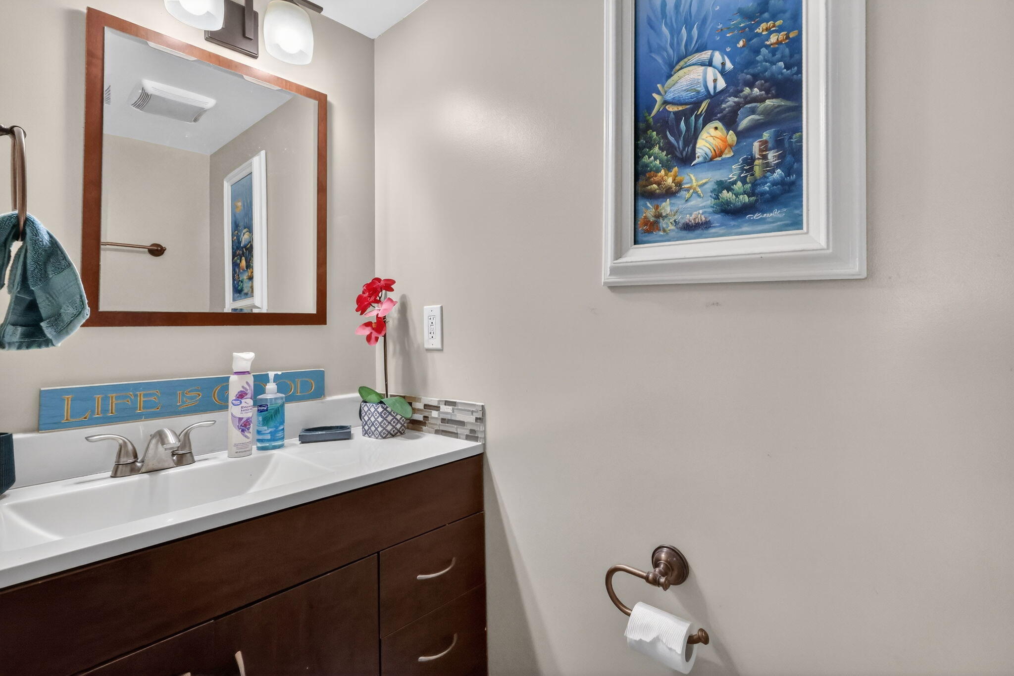 5204 Waterview Circle Palm Springs, FL 33461 - Photo 5 of 30 a bathroom with a sink mirror and vanity