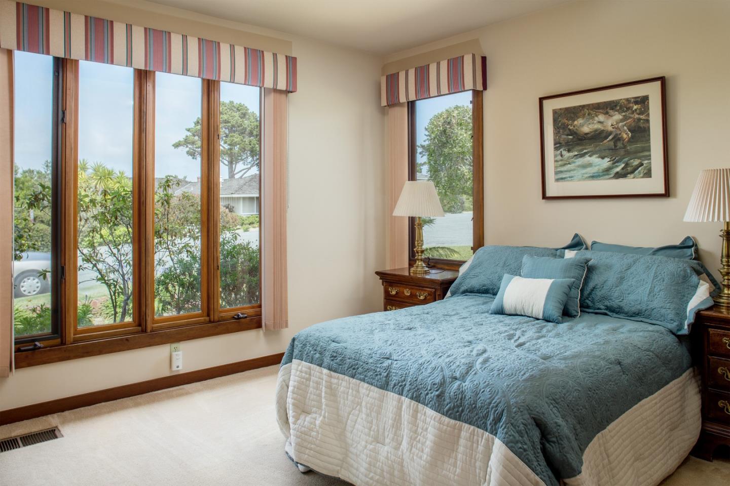 2804 Pradera Road Carmel, CA 93923 - Photo 14 of 19 a bedroom with a large bed and a large window