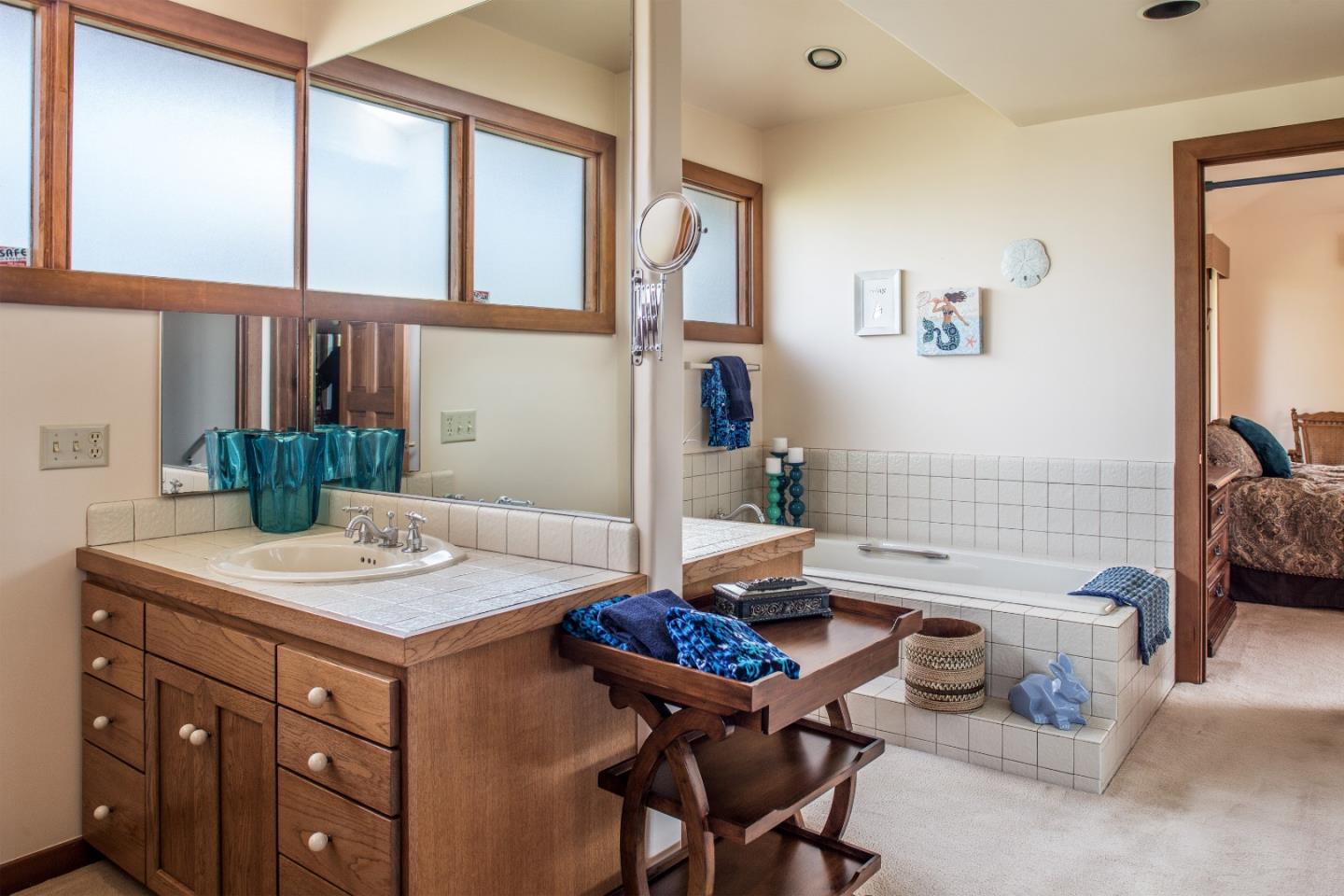2804 Pradera Road Carmel, CA 93923 - Photo 15 of 19 a view of a dining room with furniture and a chandelier