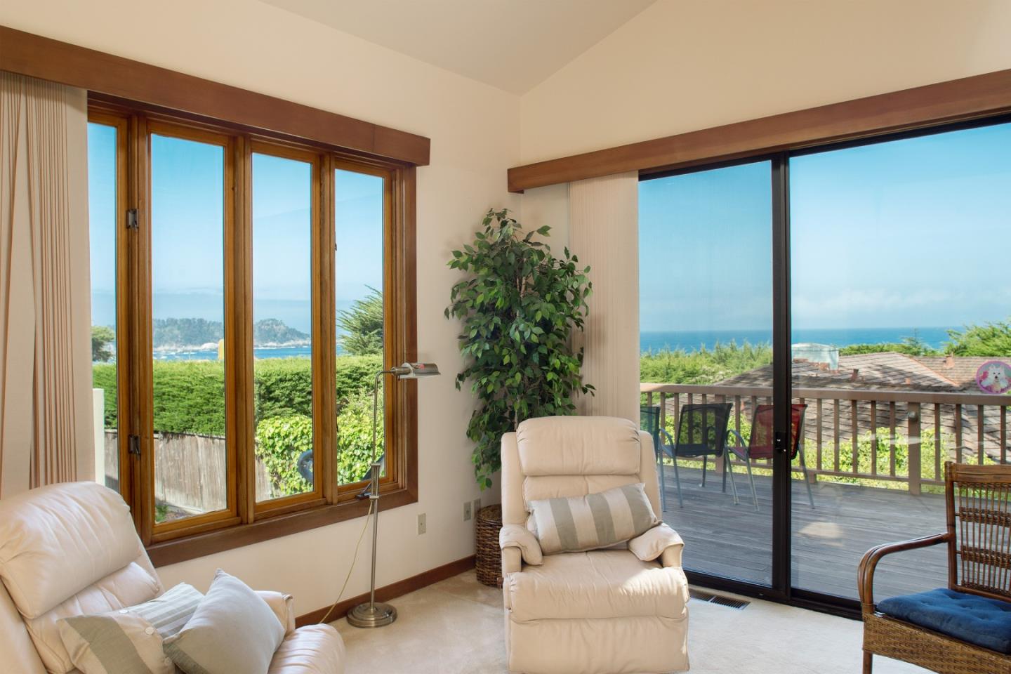 2804 Pradera Road Carmel, CA 93923 - Photo 4 of 19 a living room with furniture and a floor to ceiling window