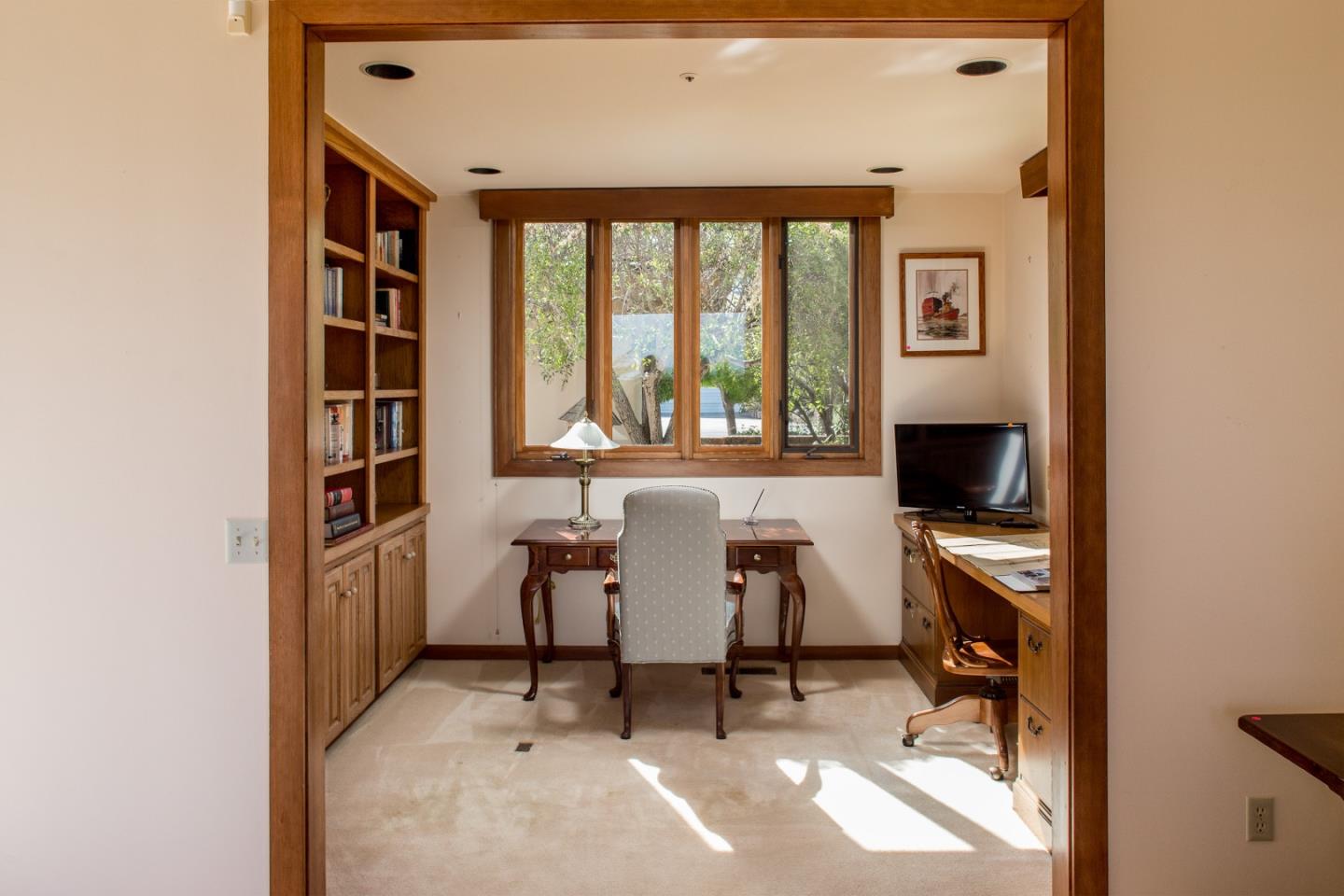 2804 Pradera Road Carmel, CA 93923 - Photo 6 of 19 a view of a workspace with furniture and a window