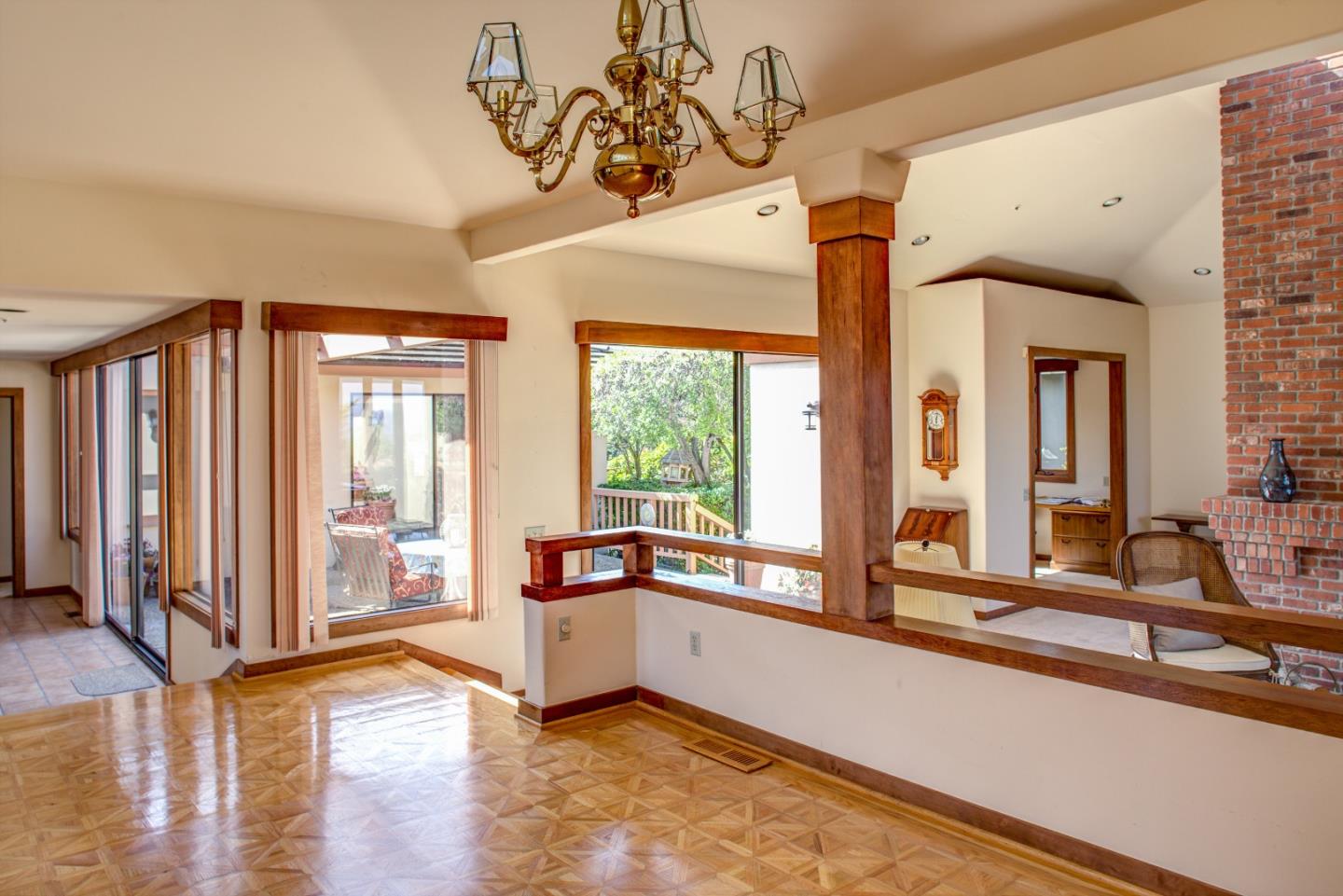 2804 Pradera Road Carmel, CA 93923 - Photo 10 of 19 a large kitchen with a large window and stainless steel appliances