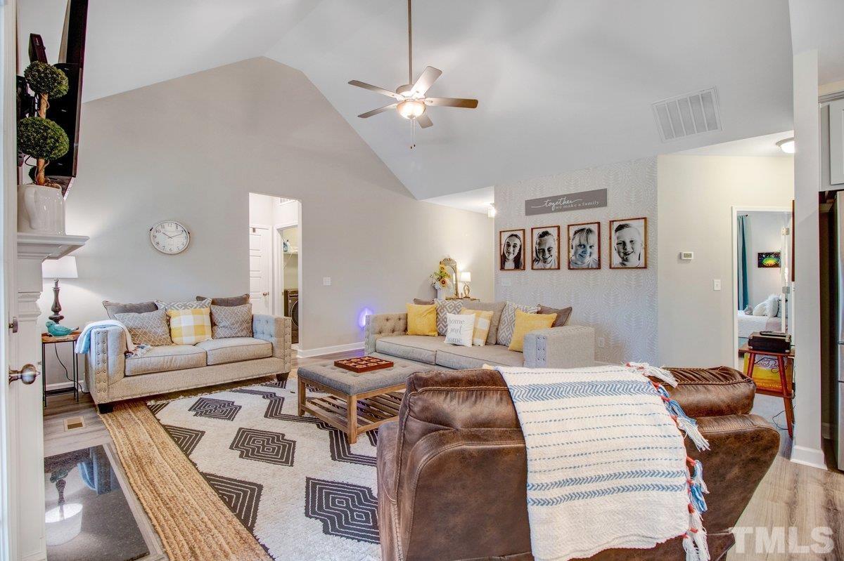 240 Northview Drive Middlesex, NC 27557 - Photo 12 of 40 a view of a livingroom with furniture and a living room