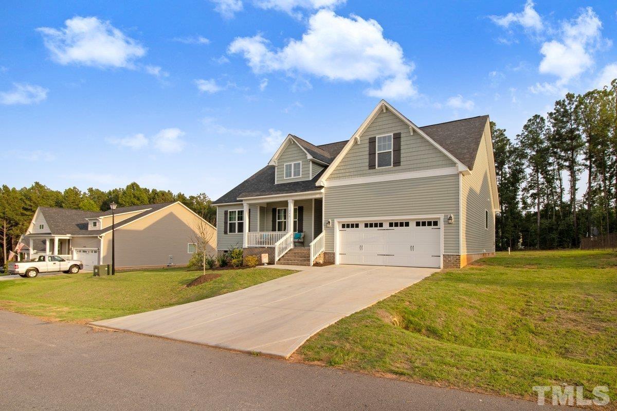 240 Northview Drive Middlesex, NC 27557 - Photo 2 of 40 a front view of a house with a yard