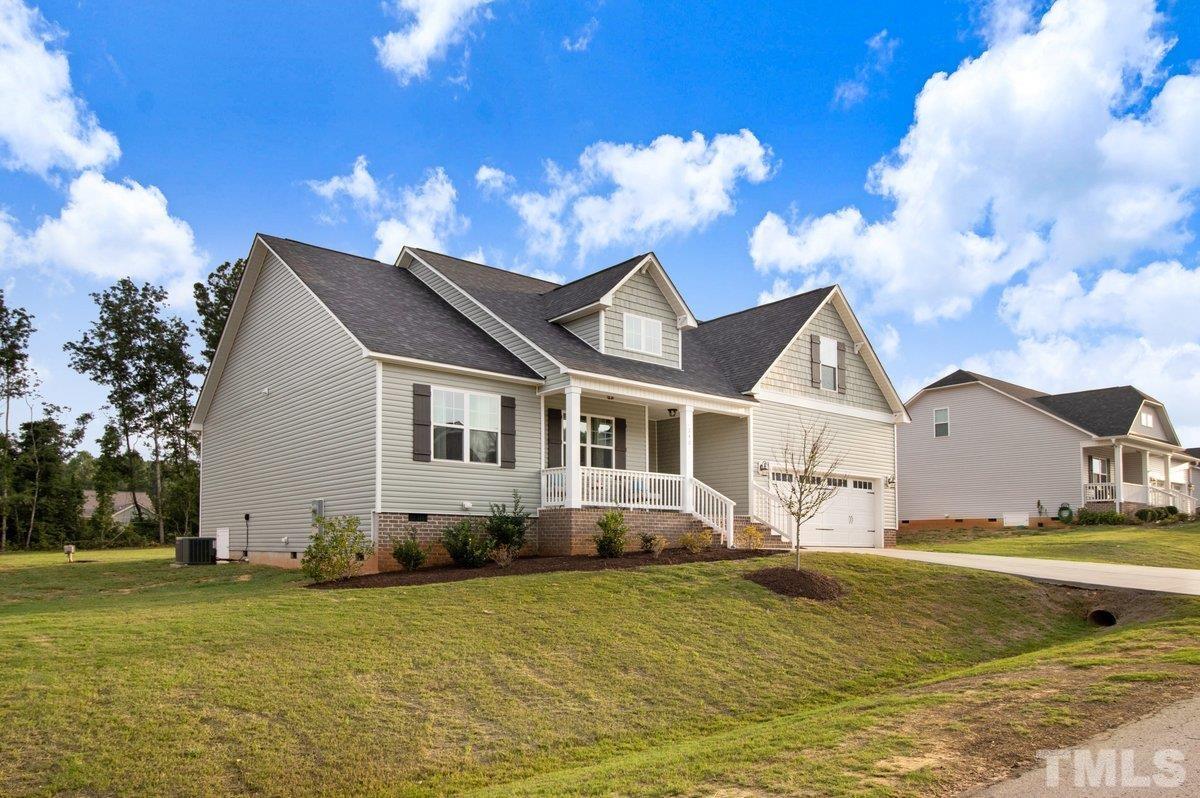 240 Northview Drive Middlesex, NC 27557 - Photo 3 of 40 a view of a house with a yard