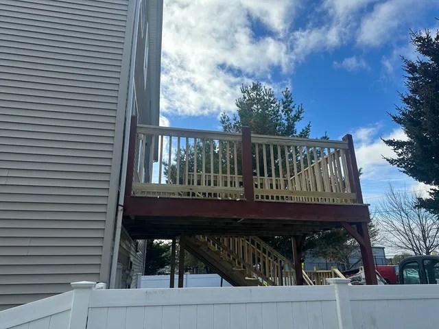 a kitchen with cabinets and stainless steel appliances