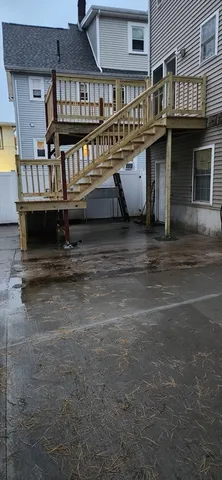 a view of wooden roof deck