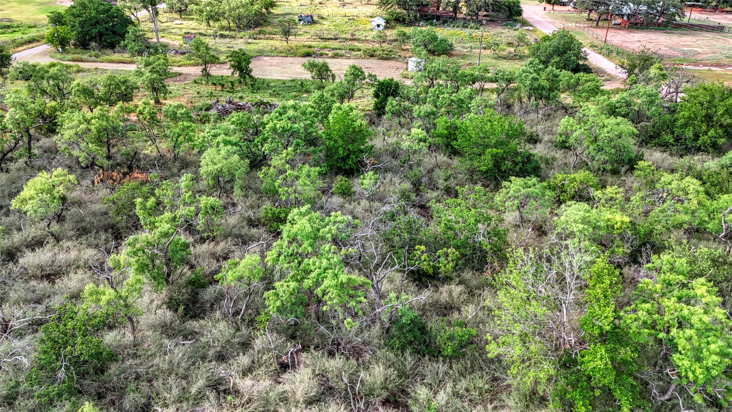114 Center St Valley Spring Valley Spring, TX 76885 - Photo 11 of 20 an aerial view of residential house with outdoor space and trees all around