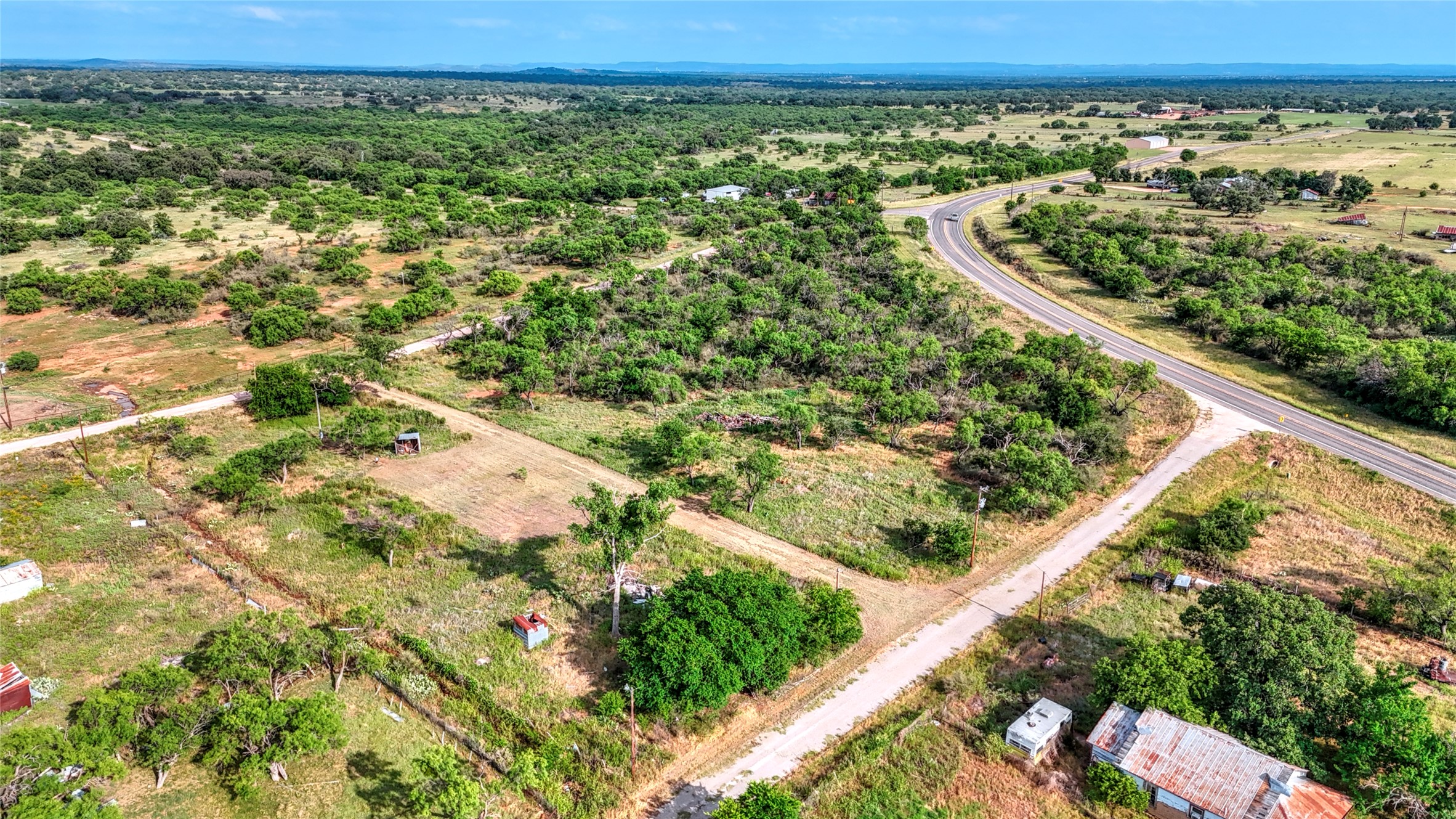 114 Center St Valley Spring Valley Spring, TX 76885 - Photo 15 of 20 a view of a lush green field