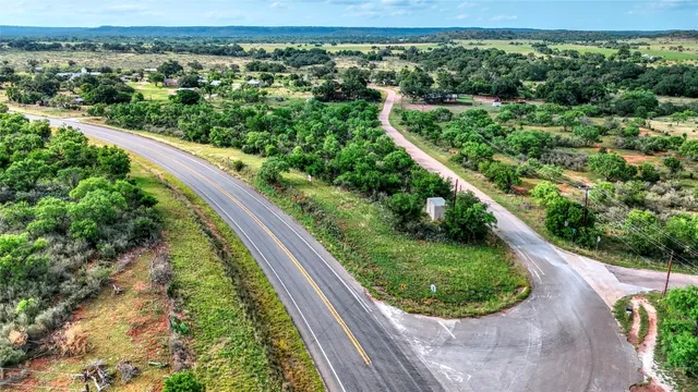a view of a garden with a lake