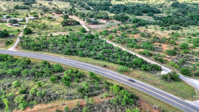 a view of a garden from a balcony