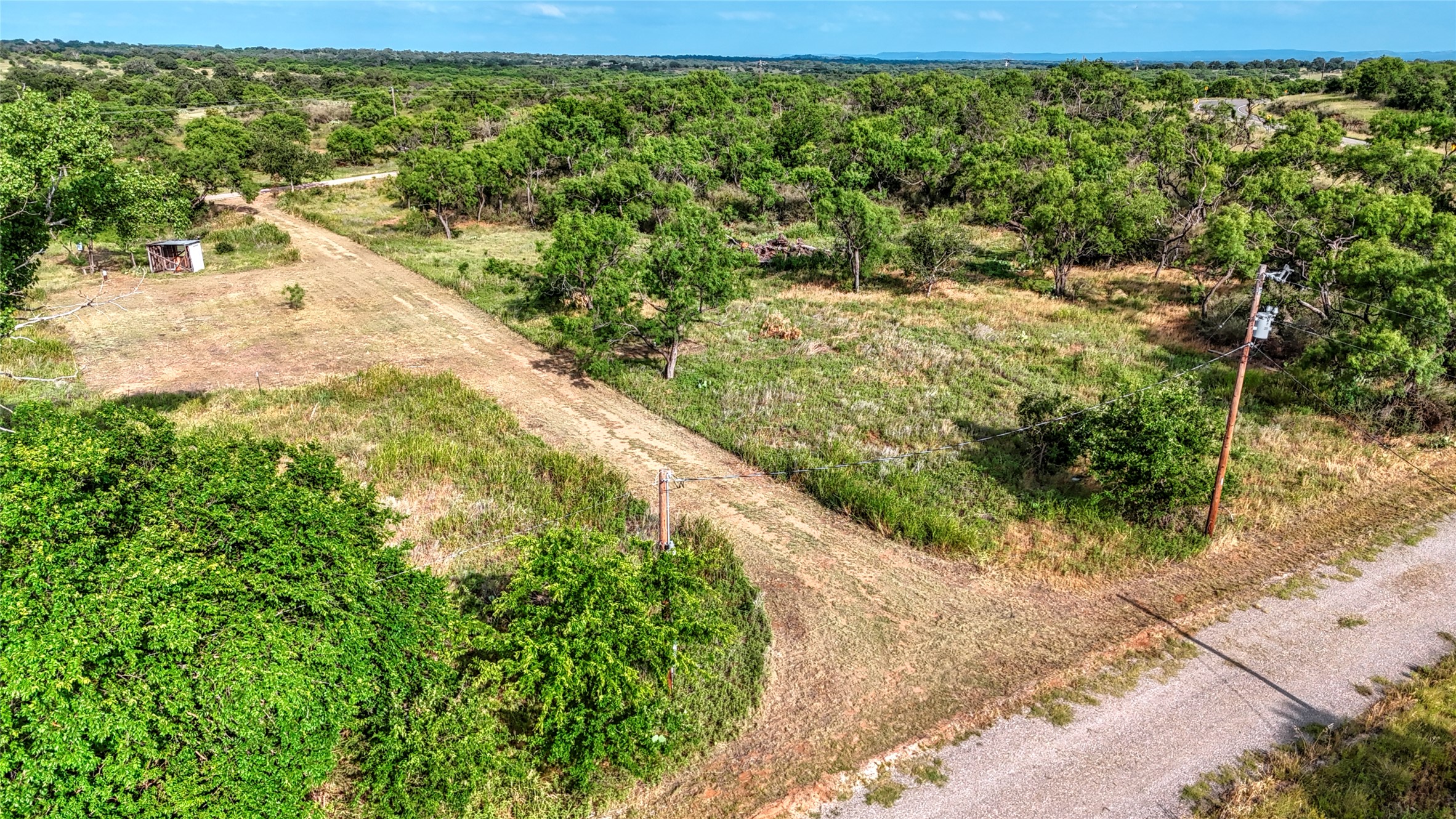 114 Center St Valley Spring Valley Spring, TX 76885 - Photo 5 of 20 a view of a yard with plants