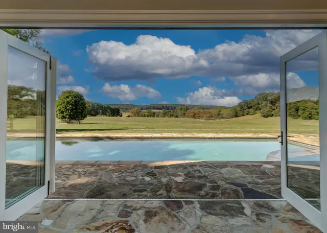 a garden view with a seating space