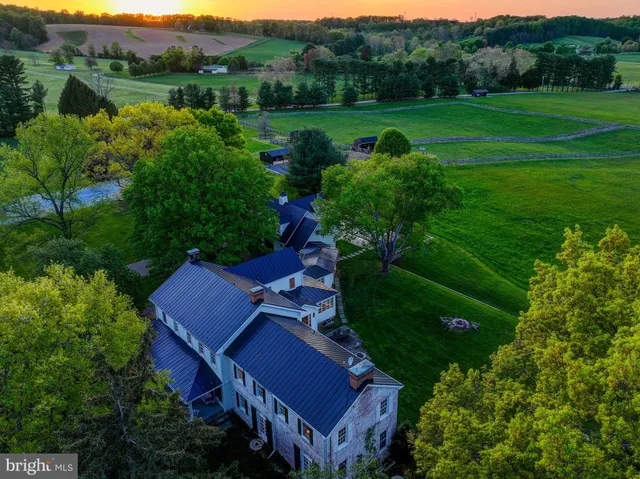 a view of a house with a big yard