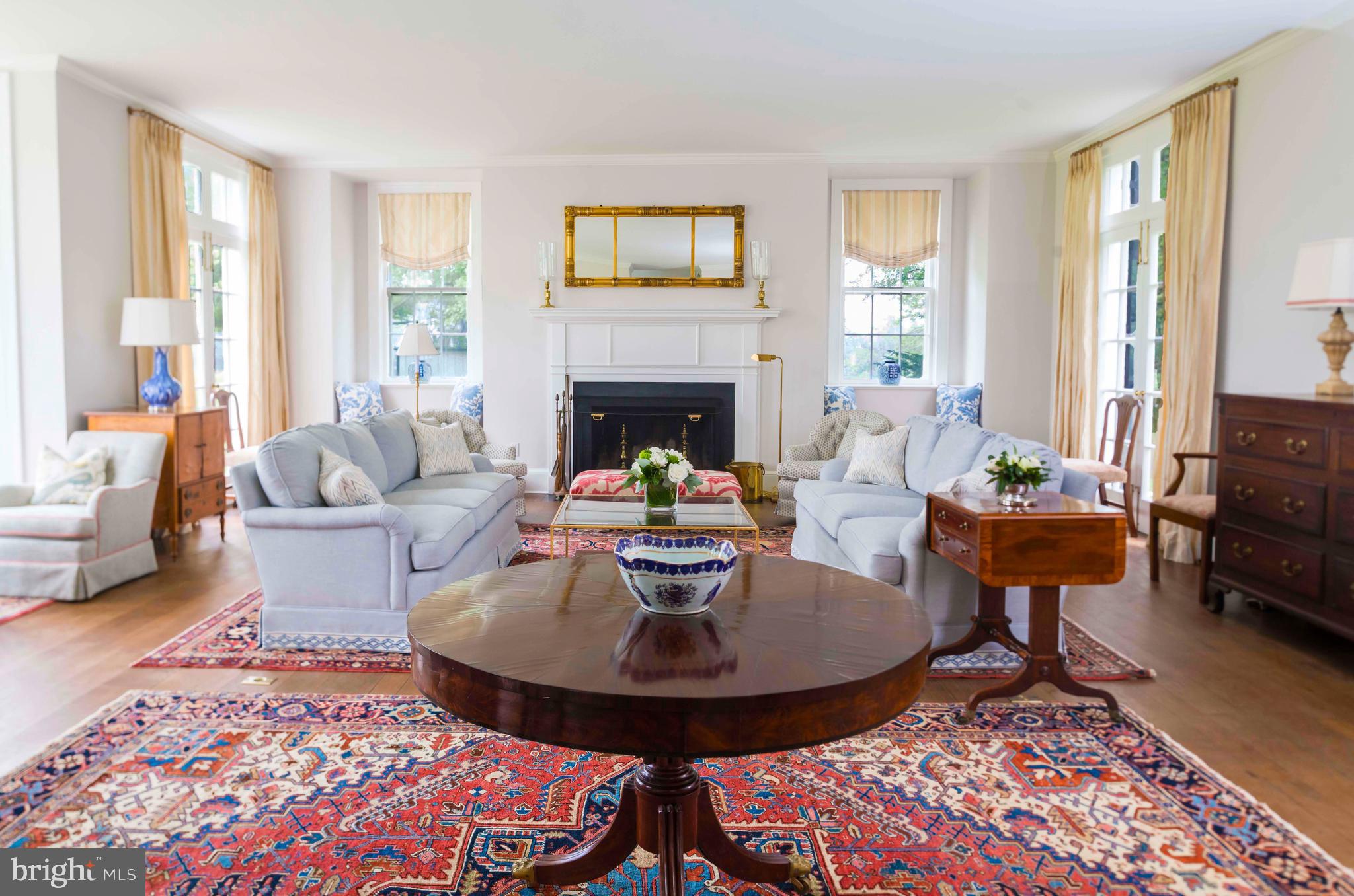 13401 Longnecker Road Reisterstown, MD 21136 - Photo 22 of 58 a living room with fireplace furniture and a table