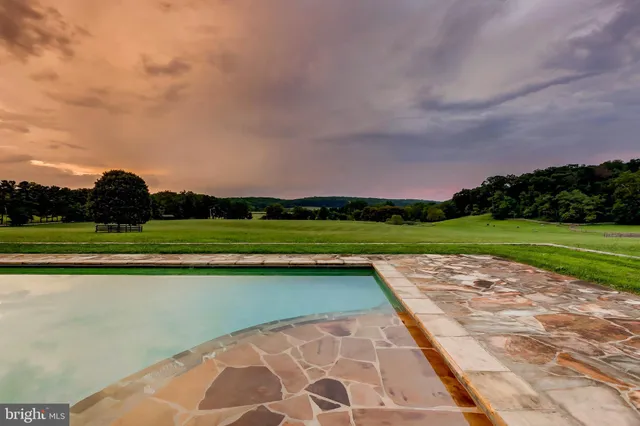 a view of a golf course with a lake