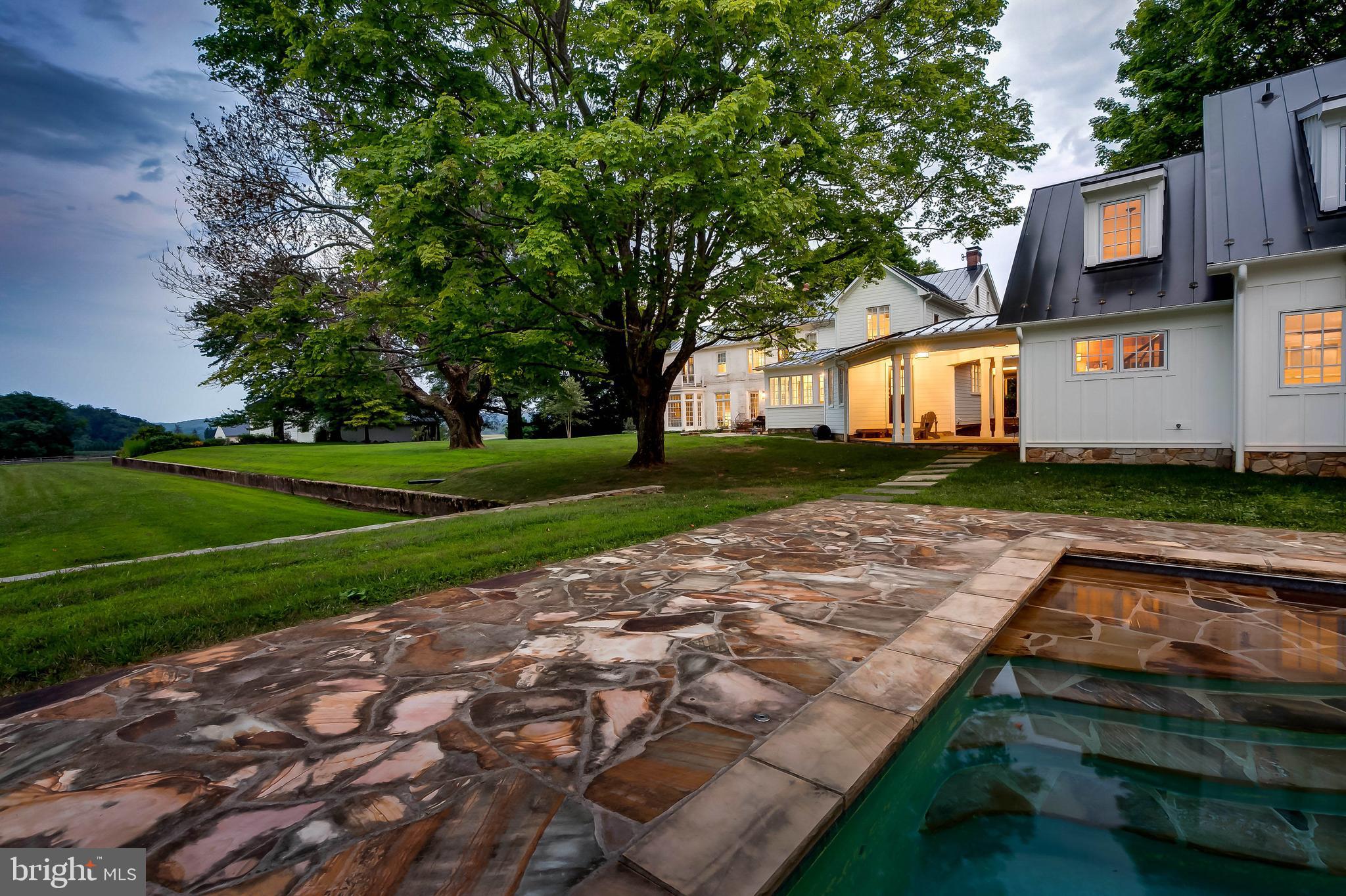 13401 Longnecker Road Reisterstown, MD 21136 - Photo 31 of 58 a view of a house with a yard