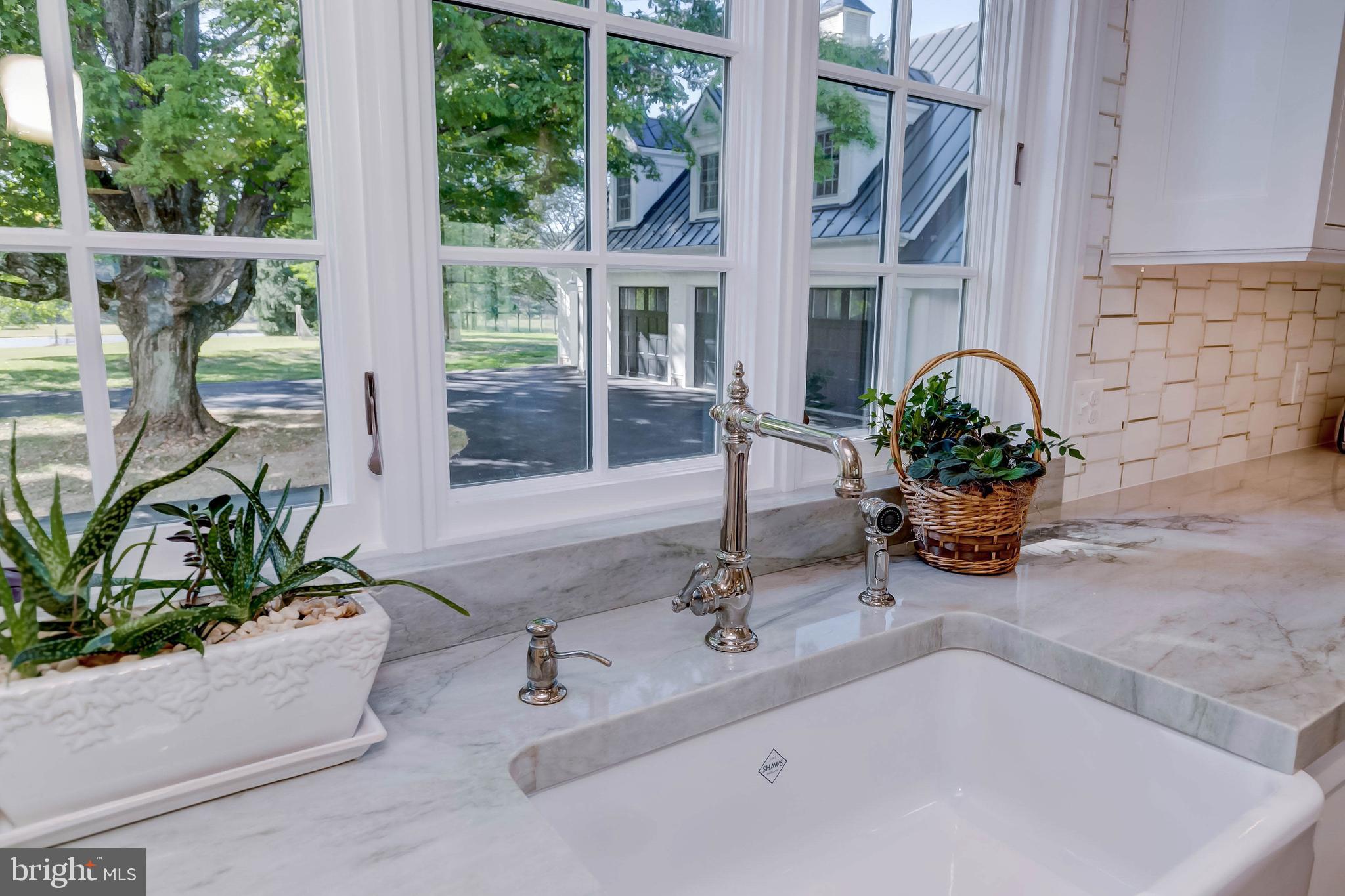 13401 Longnecker Road Reisterstown, MD 21136 - Photo 40 of 58 a bathroom with a tub a potted plant and a large window