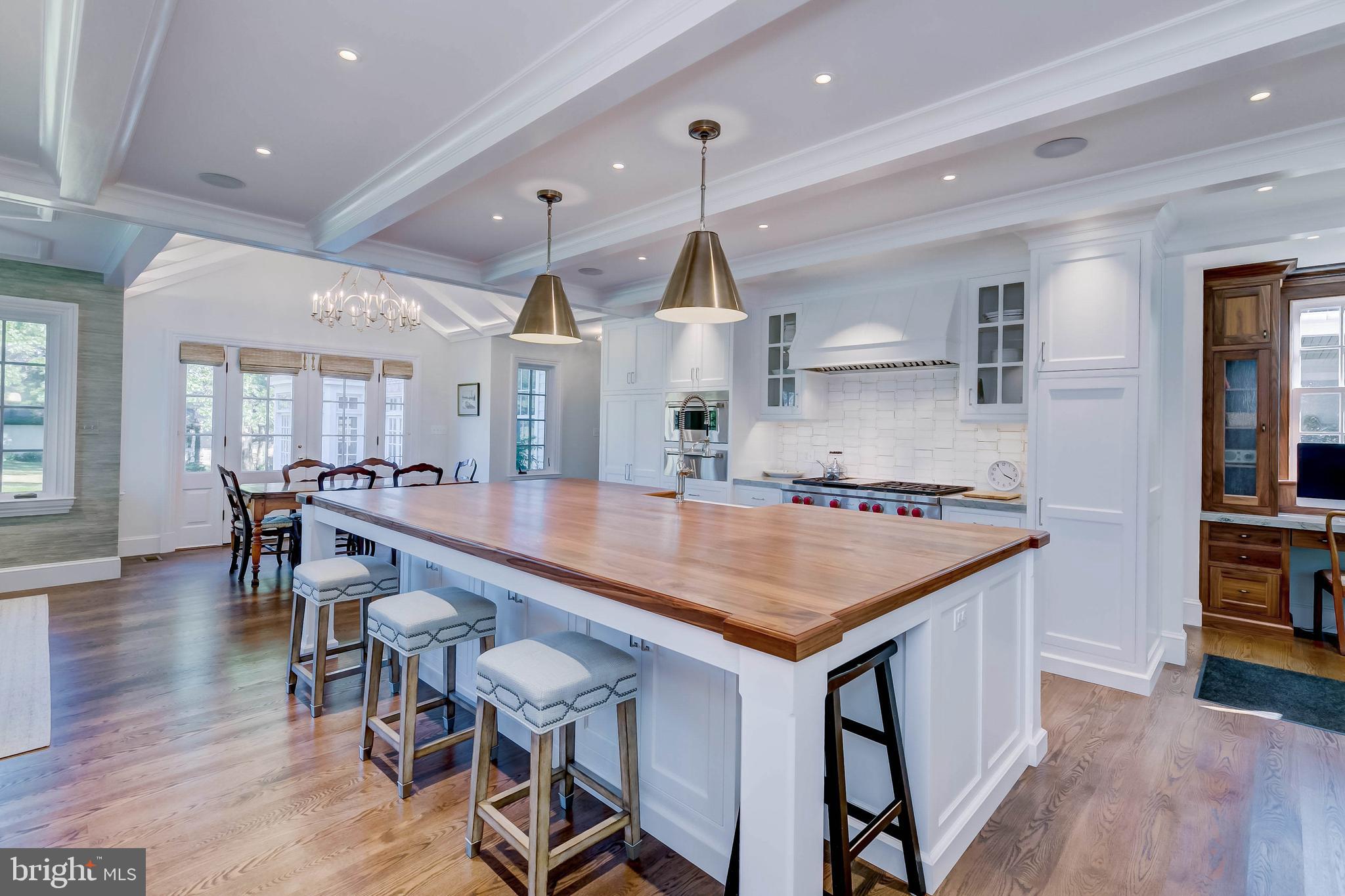 13401 Longnecker Road Reisterstown, MD 21136 - Photo 46 of 58 an open kitchen with a table and chairs in it