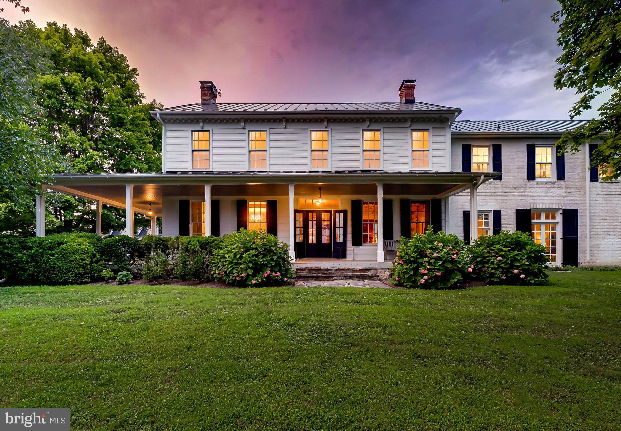 13401 Longnecker Road Reisterstown, MD 21136 - Photo 6 of 58 a front view of a house with a garden
