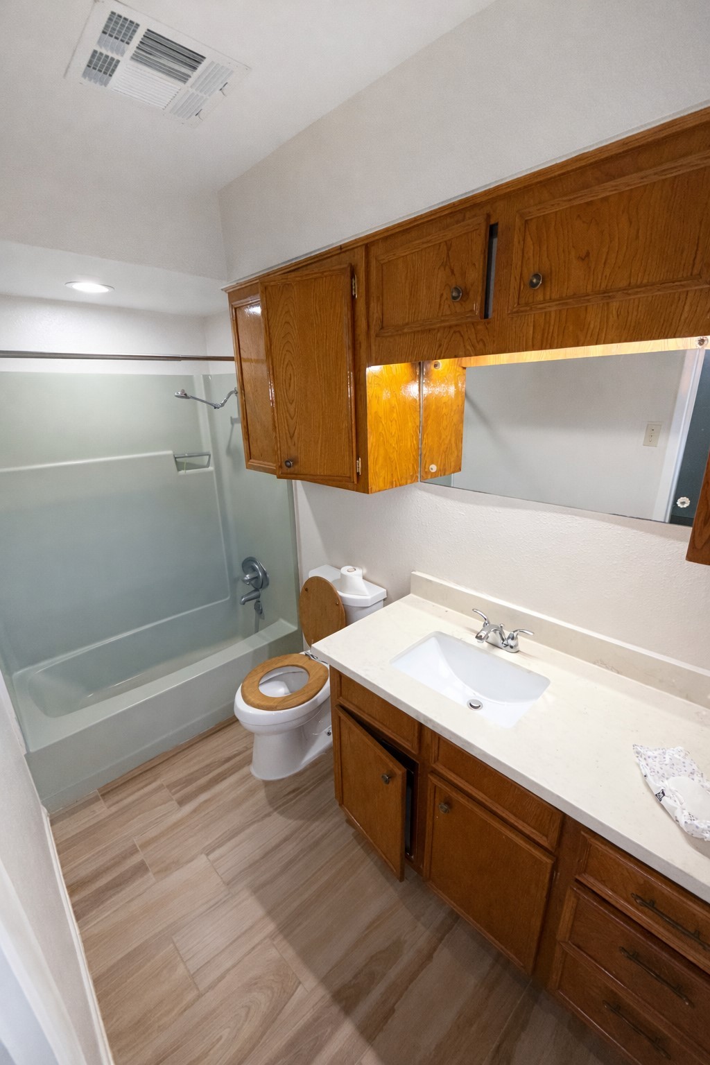 21547 Binford Road Waller, TX 77484 - Photo 12 of 19 a bathroom with a sink a toilet and mirror