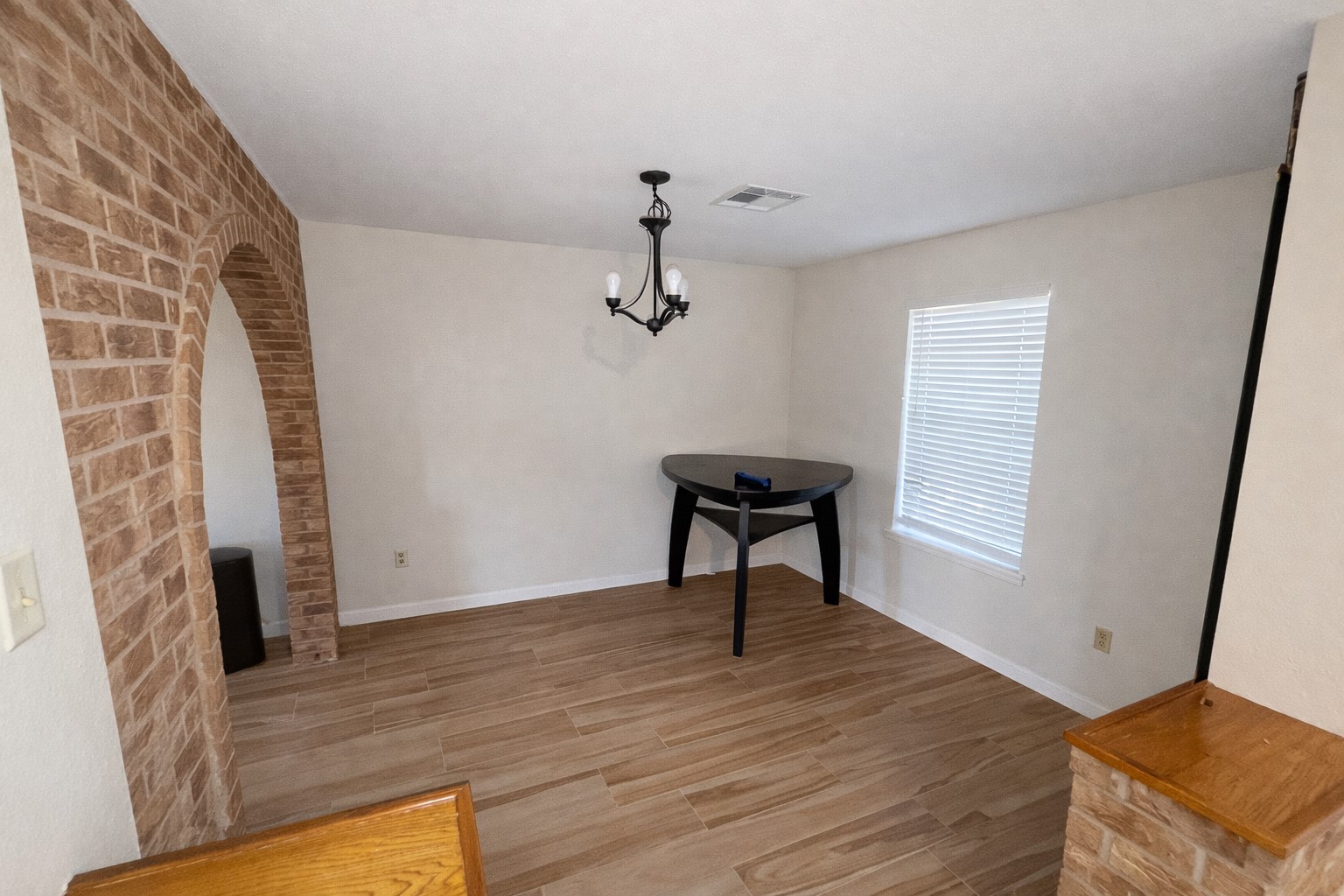 21547 Binford Road Waller, TX 77484 - Photo 9 of 19 a view of a livingroom with wooden floor and a piano