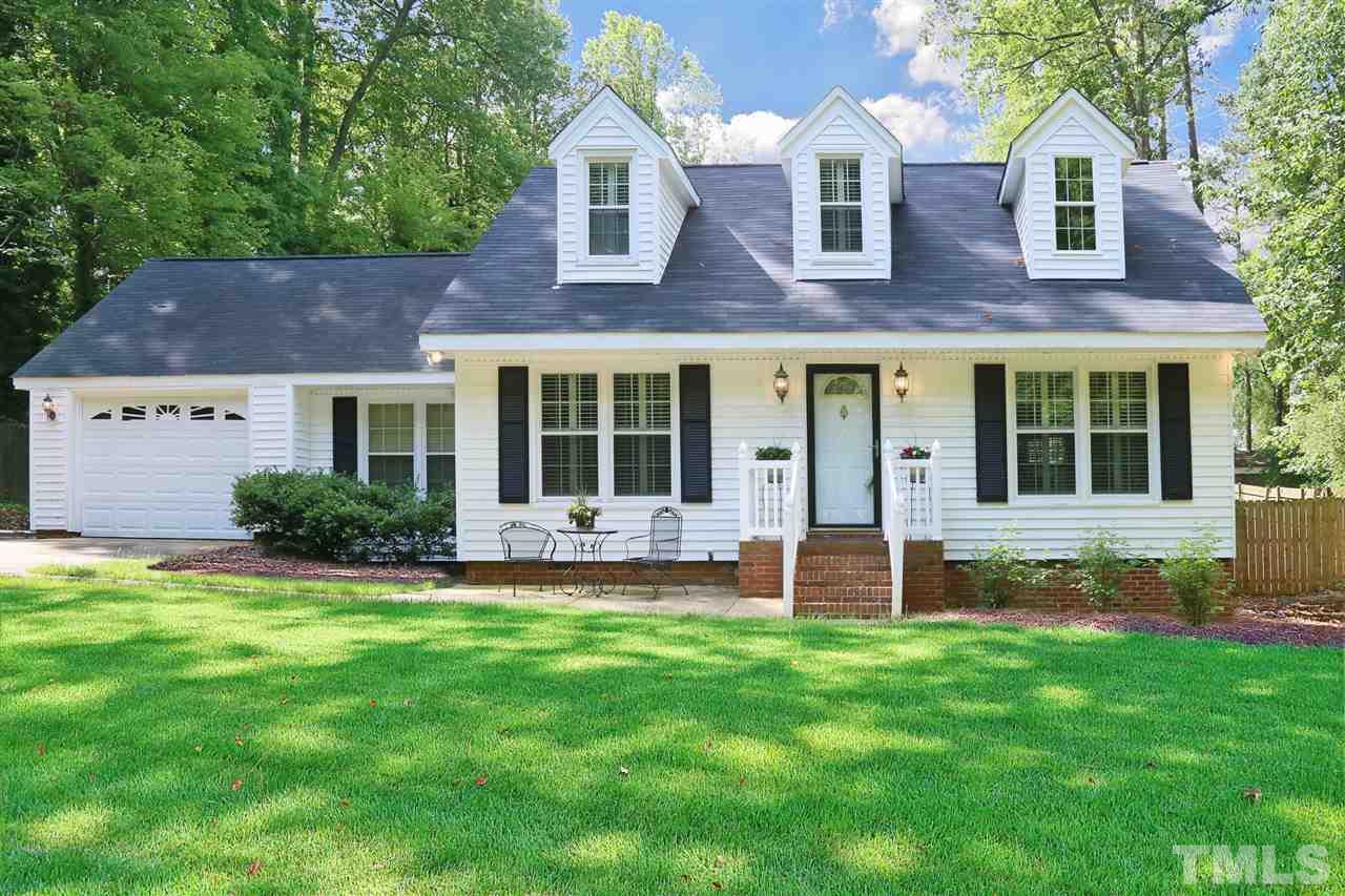 4505 Old Colony Road Raleigh, NC 27613 - Photo 1 of 30 a front view of a house with a yard