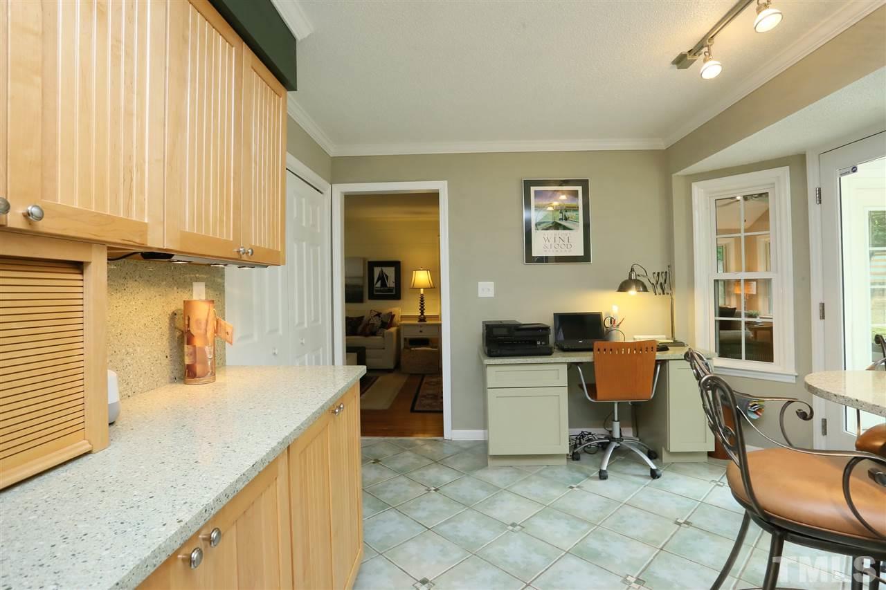 4505 Old Colony Road Raleigh, NC 27613 - Photo 16 of 30 a workspace with furniture and a window