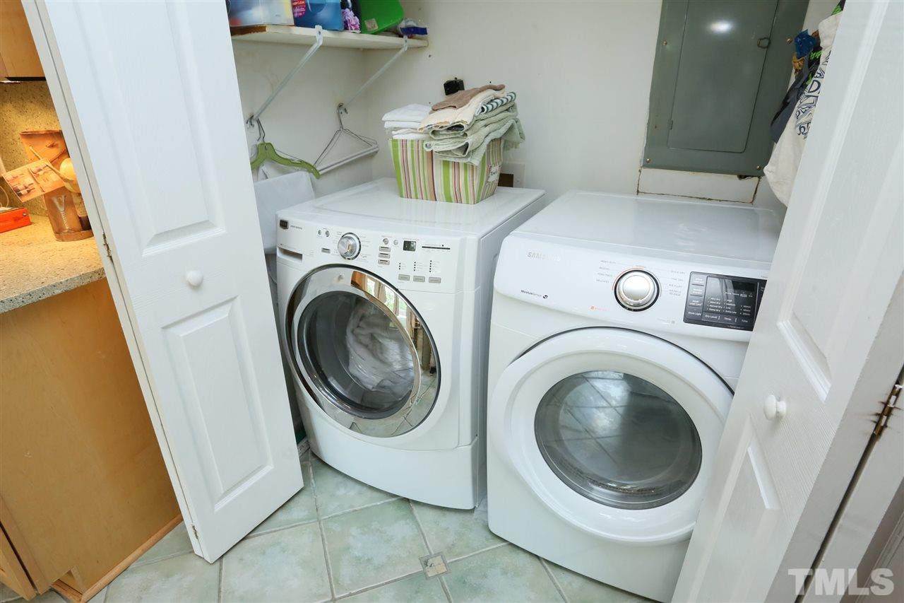 4505 Old Colony Road Raleigh, NC 27613 - Photo 18 of 30 a utility room with dryer and washer