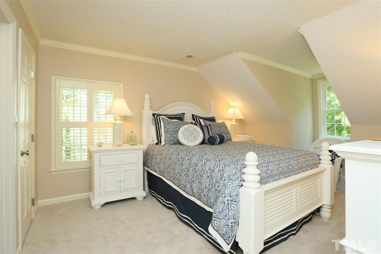 4505 Old Colony Road Raleigh, NC 27613 - Photo 27 of 30 a bedroom with a bed and window