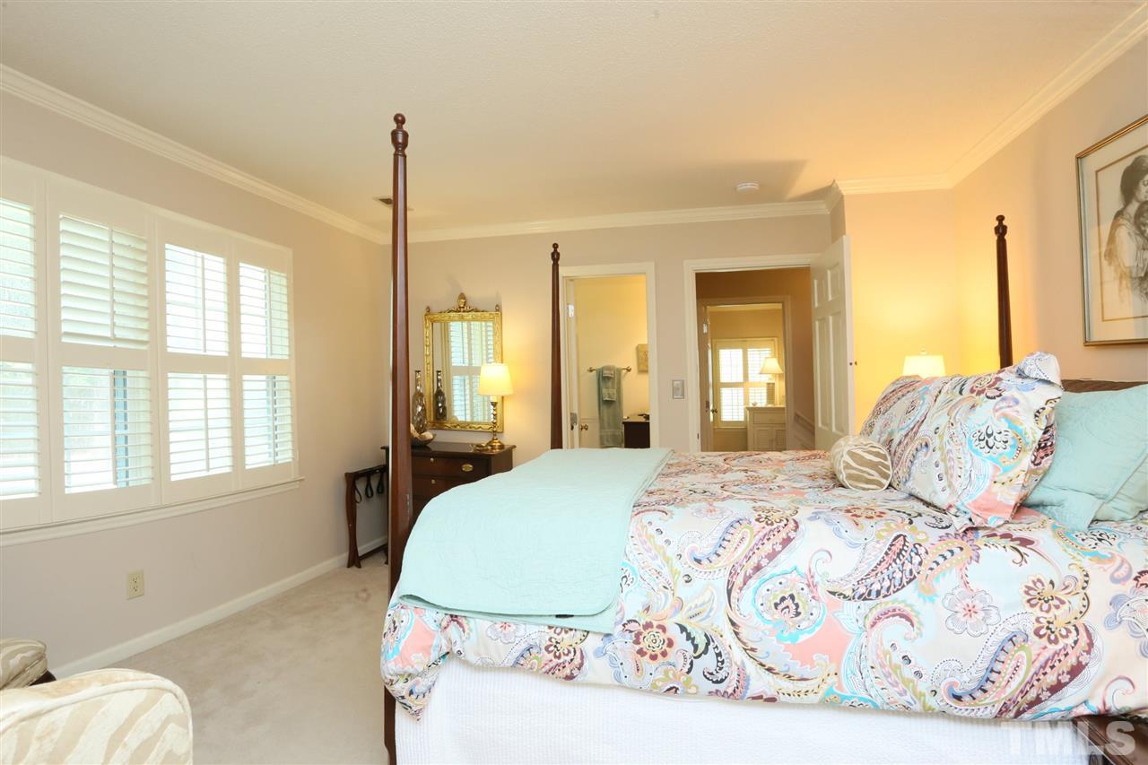 4505 Old Colony Road Raleigh, NC 27613 - Photo 29 of 30 a bedroom with a bed and a window