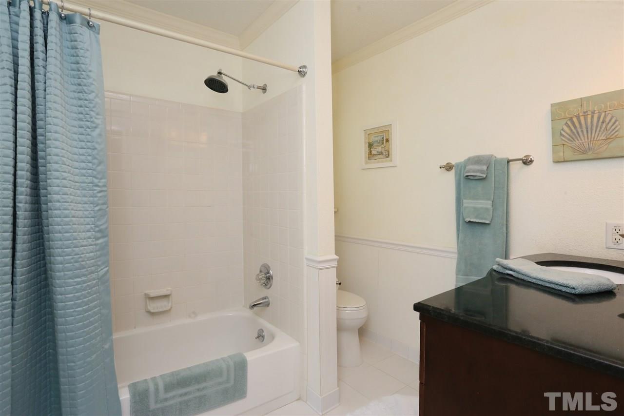 4505 Old Colony Road Raleigh, NC 27613 - Photo 30 of 30 a bathroom with a bathtub and shower