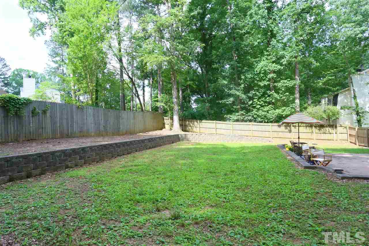4505 Old Colony Road Raleigh, NC 27613 - Photo 4 of 30 a view of a backyard with green space