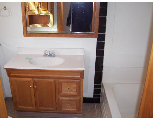 17 Crescent Road Lunenburg, MA 01462 - Photo 11 of 19 a bathroom with a sink and a mirror