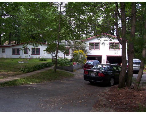 17 Crescent Road Lunenburg, MA 01462 - Photo 3 of 19 a car parked in front of a house