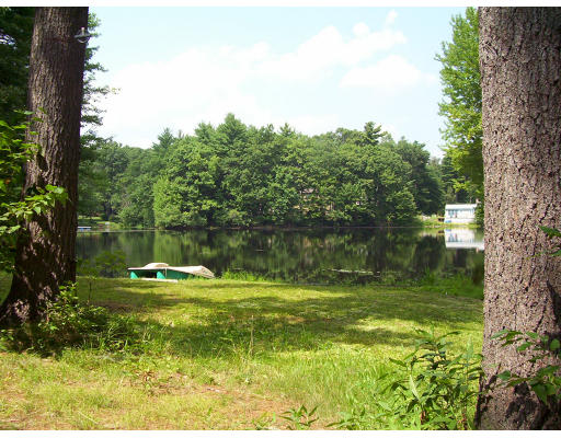 17 Crescent Road Lunenburg, MA 01462 - Photo 4 of 19 a backyard of a house with a yard and outdoor seating