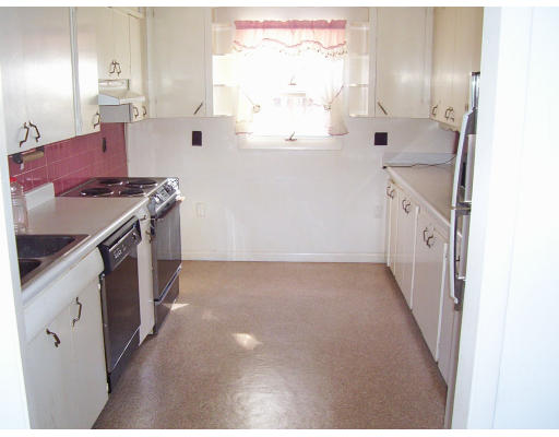 17 Crescent Road Lunenburg, MA 01462 - Photo 6 of 19 a kitchen with granite countertop white cabinets and white appliances