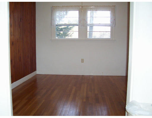 17 Crescent Road Lunenburg, MA 01462 - Photo 7 of 19 a view of an empty room with wooden floor and a window