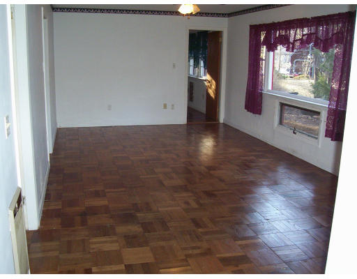 17 Crescent Road Lunenburg, MA 01462 - Photo 8 of 19 a view of a hallway with wooden floor and furniture