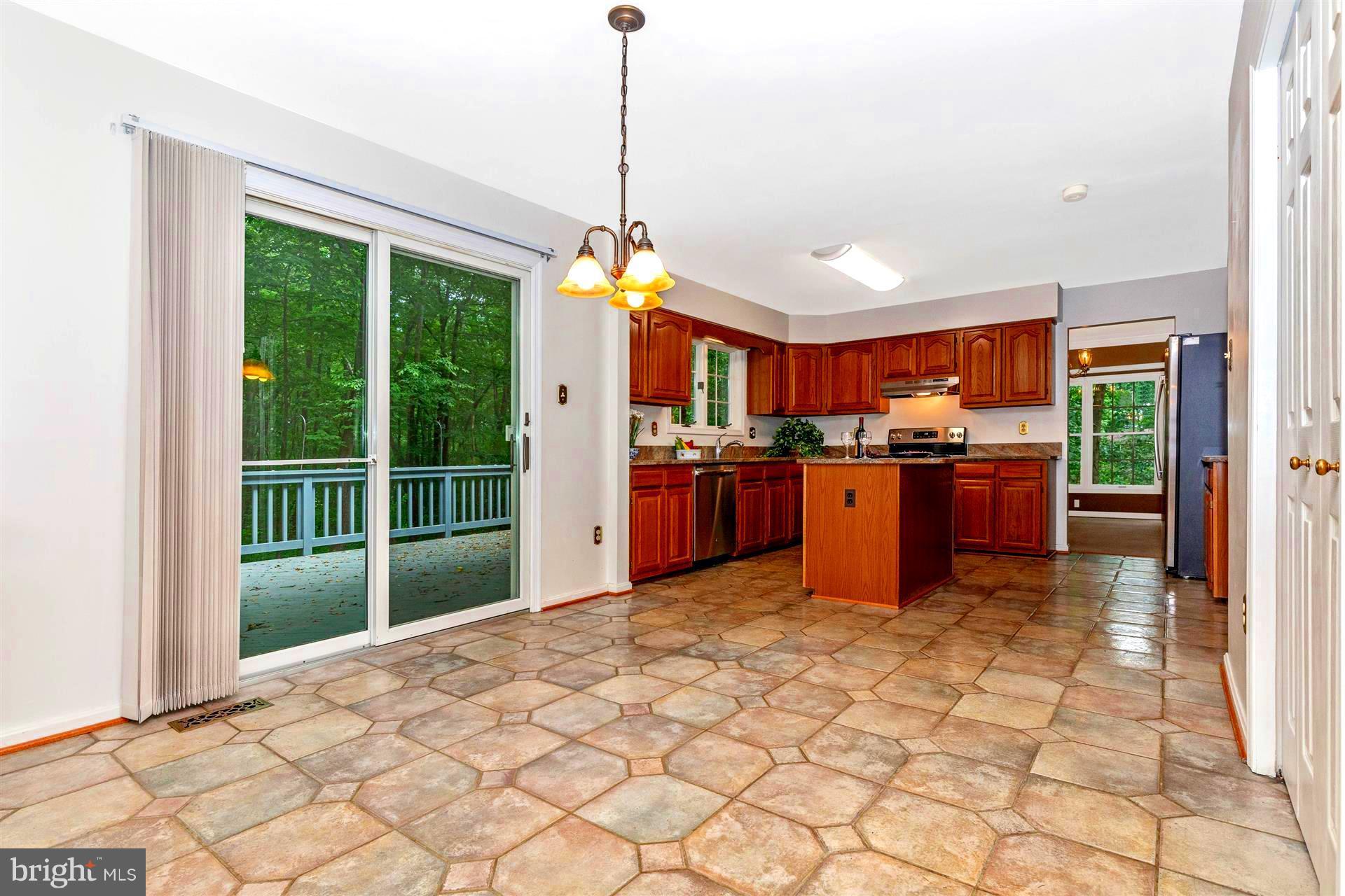 2813 Gillis Road Mount Airy, MD 21771 - Photo 10 of 30 Kitchen with eating area to Deck