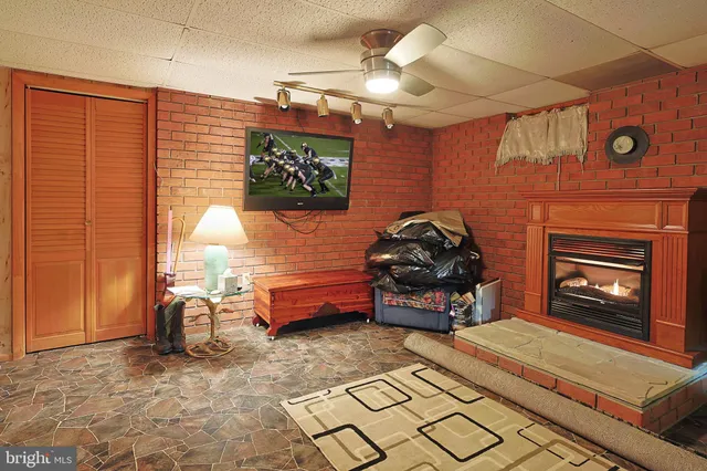 a view of a house with outdoor space and sitting area