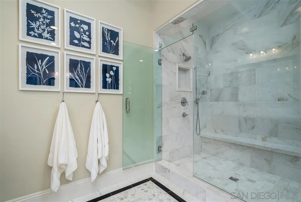 8920 Via Rancho Cielo Rancho Santa Fe, CA 92067 - Photo 11 of 25 a bathroom with a bathtub and a shower
