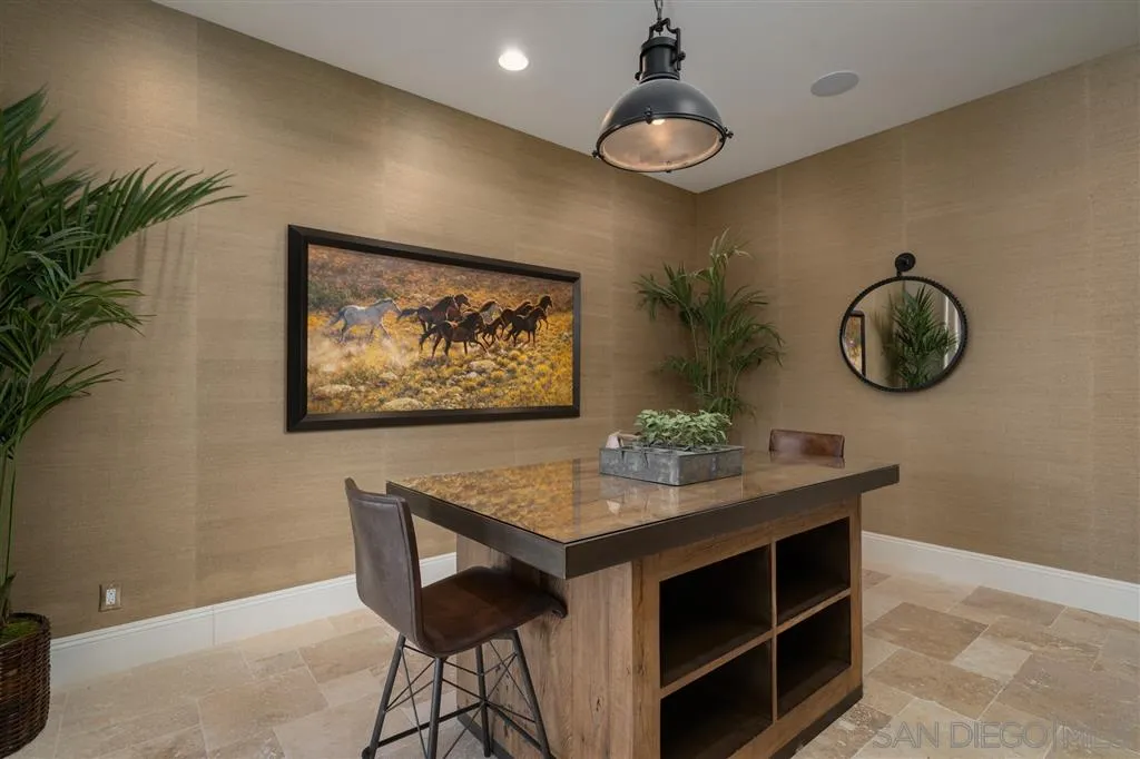8920 Via Rancho Cielo Rancho Santa Fe, CA 92067 - Photo 14 of 25 a view of a workspace with furniture