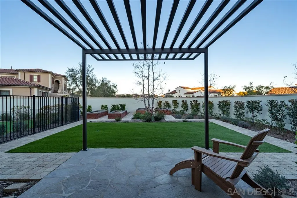 8920 Via Rancho Cielo Rancho Santa Fe, CA 92067 - Photo 17 of 25 a house view with a garden space