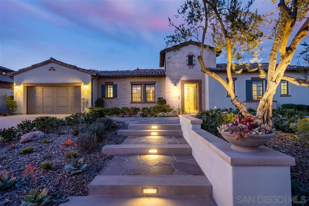 8920 Via Rancho Cielo Rancho Santa Fe, CA 92067 - Photo 2 of 25 a view of a house with a fountain