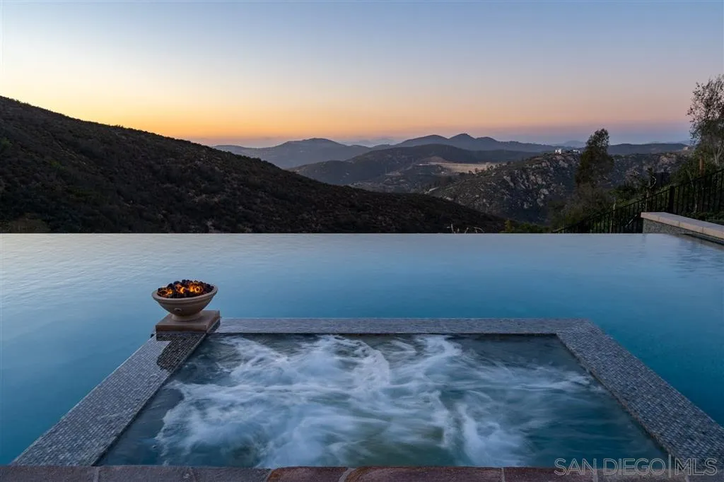 8920 Via Rancho Cielo Rancho Santa Fe, CA 92067 - Photo 22 of 25 a view of a bench in a field