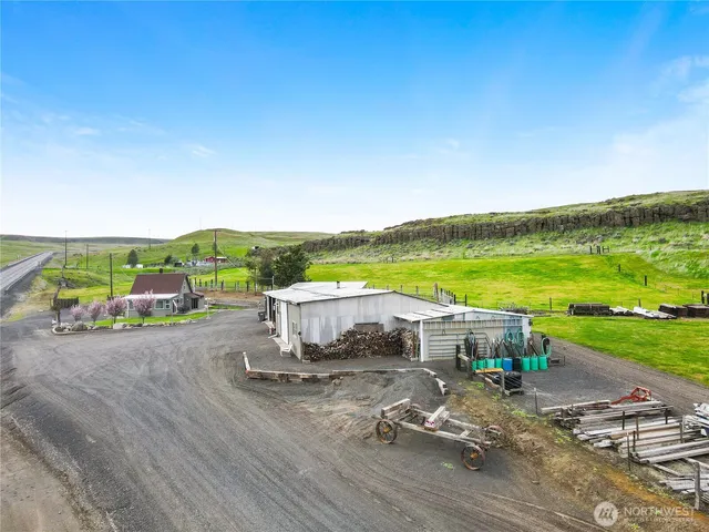 a view of a terrace with yard and ocean view